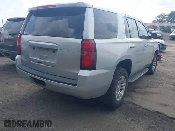 2016 Chevrolet Tahoe Commercial with VIN 1GNSKFEC8GR272043, listed as a IAAI auction lot 42127240 with 209,570 mi miles and . Bid and sale history available at DreamBid. Image 4.