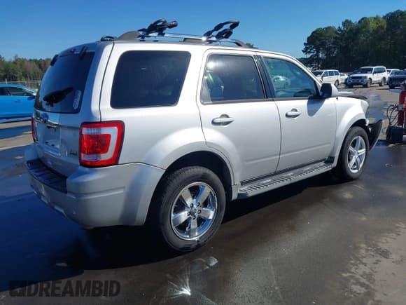 ✅ 2011 Ford Escape Limited • VIN: 1FMCU9EG7BKA54409 • Lot: 43380194. Listed on IAAI with 225,235 mi. Free auction sales archive from the USA and detailed vehicle history report at DreamBid. Image 4.