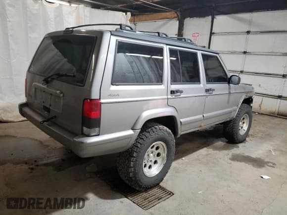 ✅ 2001 Jeep Cherokee Sport • VIN: 1J4FF58S11L549406 • Lot: 91100755. Listed on Copart with 145,496 mi. Free auction sales archive from the USA and detailed vehicle history report at DreamBid. Image 3.
