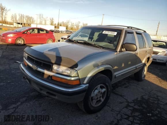 ✅ 2001 Chevrolet Blazer LT • VIN: 1GNDT13W512119786 • Lot: 87757555. Listed on Copart with 121,845 mi miles. Access the free auction sales archive from the USA and view a detailed vehicle history report at DreamBid. Image 1.