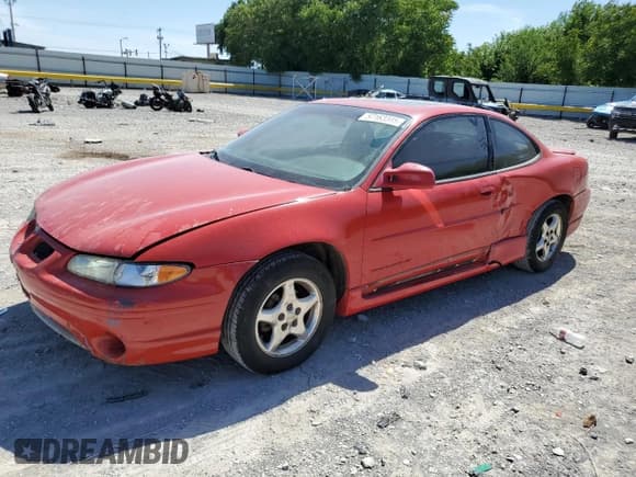 ✅ 2002 Pontiac Grand Prix GT • VIN: 1G2WP12K12F224182 • Lot: 57163345. Listed on Copart with 146,879 mi. Free auction sales archive from the USA and detailed vehicle history report at DreamBid. Image 1.