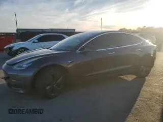 ✅ 2019 Tesla Model 3 Mid Range • VIN: 5YJ3E1EA7KF426942 • Lot: 92581375. Listed on Copart with 97,767 mi. Free auction sales archive from the USA and detailed vehicle history report at DreamBid. Image 1.