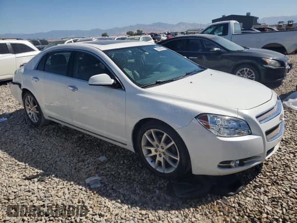 ✅ 2012 Chevrolet Malibu LTZ • VIN: 1G1ZG5E71CF130336 • Lot: 69080004. Listed on Copart with 168,690 mi. Free auction sales archive from the USA and detailed vehicle history report at DreamBid. Image 4.