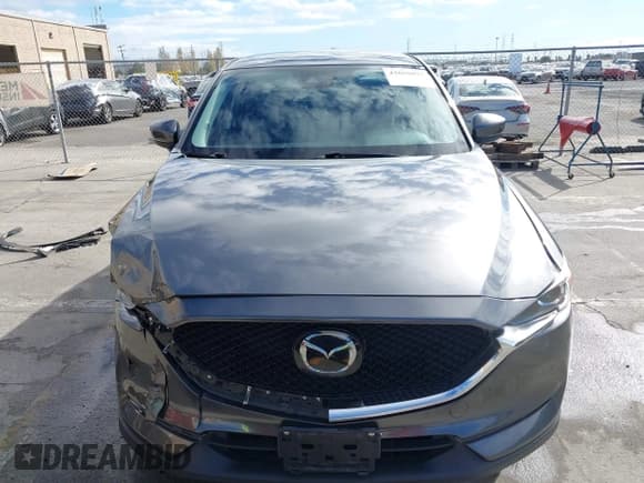 ✅ 2019 Mazda CX-5 Touring • VIN: JM3KFACM6K1501281 • Lot: 43650097. Listed on IAAI with 82,231 mi. Free auction sales archive from the USA and detailed vehicle history report at DreamBid. Image 13.
