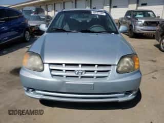 2003 Hyundai Accent GL with VIN KMHCG35CX3U274974, listed as a Copart auction lot 68807494 with 133,791 mi miles and Non repairable. Bid and sale history available at DreamBid. Image 5.