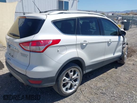 ✅ 2015 Ford Escape Titanium • VIN: 1FMCU0J98FUB63295 • Lot: 42007554. Listed on IAAI with 137,061 mi. Free auction sales archive from the USA and detailed vehicle history report at DreamBid. Image 4.