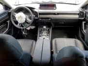 ✅ 2025 Mazda CX-50 Hybrid Premium Plus Package • VIN: 7MMVAAEW7SN103749 • Lot: 61268455. Wystawiony na Copart z przebiegiem 3 877 mil. Bezpłatny archiwum sprzedaży aukcyjnych z USA i szczegółowy raport historii pojazdu na DreamBid. Zdjęcie 8.