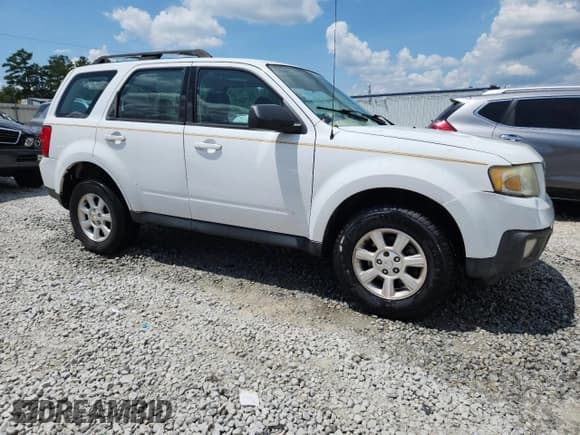 ✅ 2008 Mazda Tribute Sport • VIN: 4F2CZ02Z28KM23502 • Lot: 65906795. Listed on Copart with 135,809 mi. Free auction sales archive from the USA and detailed vehicle history report at DreamBid. Image 4.