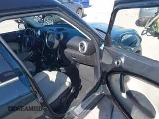 ✅ 2012 MINI Countryman S • VIN: WMWZC5C56CWM11856 • Lot: 43694647. Listed on IAAI with 150,155 mi. Free auction sales archive from the USA and detailed vehicle history report at DreamBid. Image 5.