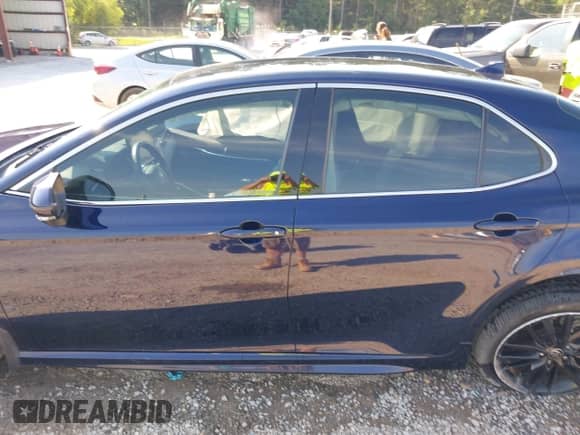 2021 Toyota Camry XSE with VIN 4T1K61AK4MU615383, listed as a IAAI auction lot 43193305 with 57,706 mi miles and . Bid and sale history available at DreamBid. Image 14.