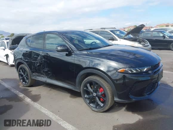 2024 Dodge Hornet GT z VIN ZACNDFAN8R3A14928, wystawiony jako IAAI lot #42387134 z przebiegiem 27 254 mil mil oraz . Historia ofert i sprzedaży dostępna na DreamBid. Obrazek 1.