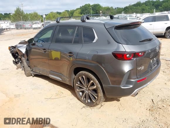 ✅ 2023 Mazda CX-50 Meridian Edition • VIN: 7MMVABXY2PN141188 • Lot: 43037021. Wystawiony na IAAI z przebiegiem 26 016 mil. Bezpłatny archiwum sprzedaży aukcyjnych z USA i szczegółowy raport historii pojazdu na DreamBid. Zdjęcie 3.