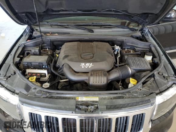 ✅ 2012 Jeep Grand Cherokee Laredo • VIN: 1C4RJFAG8CC178034 • Лот: 92105595. Опубликован ранее на Copart с пробегом 164 861 миль. Бесплатный доступ к архиву аукционных продаж из США и подробный отчёт об истории автомобиля на DreamBid. Изображение 12.