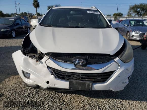 2014 Hyundai Tucson SE z VIN KM8JU3AG1EU889506, wystawiony jako Copart lot #84914605 z przebiegiem 147 809 mil mil oraz Szkoda całkowita • Salvage title. Historia ofert i sprzedaży dostępna na DreamBid. Obrazek 5.