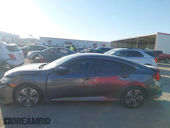✅ 2018 Honda Civic EX-T • VIN: JHMFC1F37JX038034 • Lot: 43645118. Listed on IAAI with 144,999 mi. Free auction sales archive from the USA and detailed vehicle history report at DreamBid. Image 14.