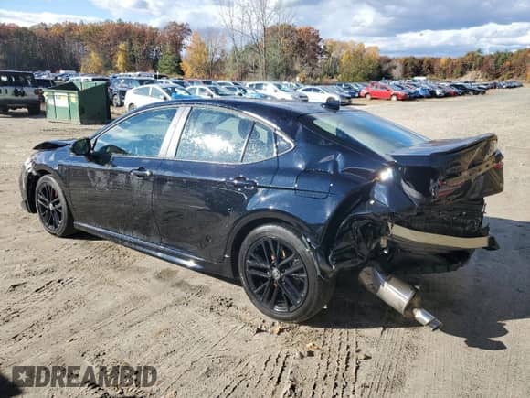 2025 Toyota Camry LE with VIN 4T1DAACK8SU607689, listed as a Copart auction lot 87370685 with 10,821 mi miles and Clean title. Bid and sale history available at DreamBid. Image 2.