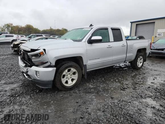 2017 Chevrolet Silverado 1500 LT with VIN 1GCVKREC4HZ326298, listed as a Copart auction lot 85676485 with 104,042 mi miles and Salvage title. Bid and sale history available at DreamBid. Image 1.