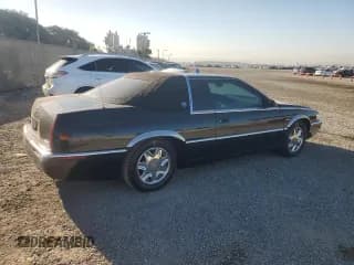 ✅ 2001 Cadillac Eldorado ESC • VIN: 1G6EL12Y21B105623 • Лот: 80270274. Опубликован ранее на Copart с пробегом 100 143 миль. Бесплатный доступ к архиву аукционных продаж из США и подробный отчёт об истории автомобиля на DreamBid. Изображение 3.