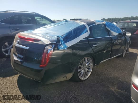 ✅ 2014 Cadillac XTS Platinum • VIN: 2G61W5S82E9164403 • Лот: 65878025. Опубликован ранее на Copart с пробегом Не указан. Бесплатный доступ к архиву аукционных продаж из США и подробный отчёт об истории автомобиля на DreamBid. Изображение 3.