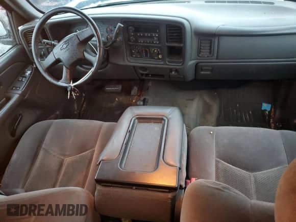 2006 Chevrolet Silverado 1500 LS z VIN 1GCEK19V76Z205081, wystawiony jako Copart lot #81746094 z przebiegiem 112 969 mil mil oraz Czysty tytuł • Clean title. Historia ofert i sprzedaży dostępna na DreamBid. Obrazek 8.