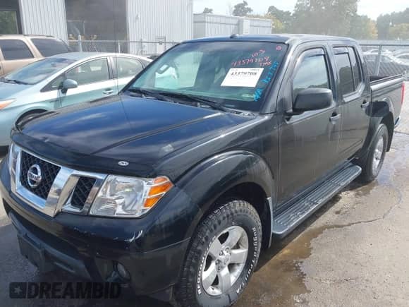 2013 Nissan Frontier SV z VIN 1N6AD0EV1DN763745, wystawiony jako IAAI lot #43379708 z przebiegiem 106 937 mil mil oraz . Historia ofert i sprzedaży dostępna na DreamBid. Obrazek 2.