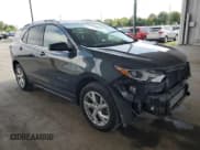 ✅ 2020 Chevrolet Equinox LT • VIN: 3GNAXVEX1LS566546 • Lot: 68853365. Wystawiony na Copart z przebiegiem 99 961 mil. Bezpłatny archiwum sprzedaży aukcyjnych z USA i szczegółowy raport historii pojazdu na DreamBid. Zdjęcie 4.