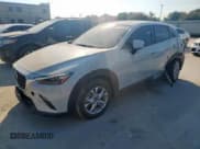✅ 2021 Mazda CX-3 Sport • VIN: JM1DKDB75M1503150 • Лот: 68375555. Опубликован ранее на Copart с пробегом 22 231 миль. Бесплатный доступ к архиву аукционных продаж из США и подробный отчёт об истории автомобиля на DreamBid. Изображение 1.