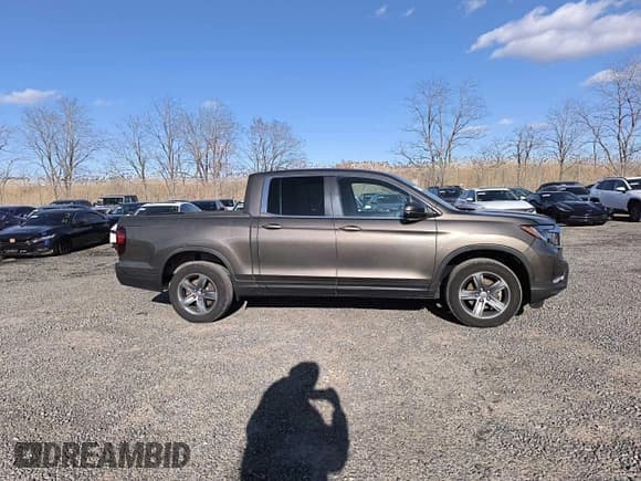 ✅ 2023 Honda Ridgeline RTL • VIN: 5FPYK3F58PB004446 • Lot: 91694765. Wystawiony na Copart z przebiegiem 57 866 mil. Bezpłatny archiwum sprzedaży aukcyjnych z USA i szczegółowy raport historii pojazdu na DreamBid. Zdjęcie 15.