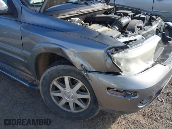 ✅ 2005 Buick Rainier CXL • VIN: 5GAET13M752201635 • Лот: 43671612. Опубликован ранее на IAAI с пробегом 200 000 миль. Бесплатный доступ к архиву аукционных продаж из США и подробный отчёт об истории автомобиля на DreamBid. Изображение 14.