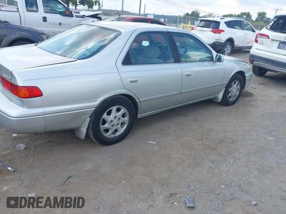 ✅ 2001 Toyota Camry LE • VIN: JT2BF22KX10300429 • Lot: 43022403. Listed on IAAI with 280,436 mi. Free auction sales archive from the USA and detailed vehicle history report at DreamBid. Image 4.