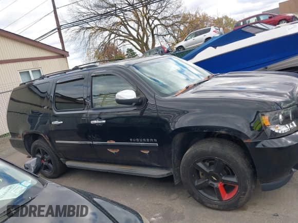 ✅ 2012 Chevrolet Suburban LTZ • VIN: 1GNSKKE70CR186859 • Lot: 43635782. Wystawiony na IAAI z przebiegiem 168 589 mil. Bezpłatny archiwum sprzedaży aukcyjnych z USA i szczegółowy raport historii pojazdu na DreamBid. Zdjęcie 13.