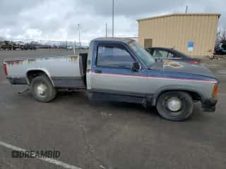 1989 Dodge Dakota S с VIN 1B7GL26X9KS129335, выставлен на аукционе Copart как лот 82744003 с пробегом 174 152 миль миль и Списание • Salvage title. История ставок и продаж доступна на DreamBid. Изображение 4.