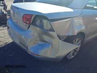 ✅ 2012 Volkswagen Eos Komfort • VIN: WVWBW7AH5CV013113 • Lot: 43471186. Wystawiony na IAAI z przebiegiem 96 961 mil. Bezpłatny archiwum sprzedaży aukcyjnych z USA i szczegółowy raport historii pojazdu na DreamBid. Zdjęcie 6.