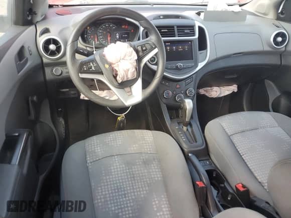 2020 Chevrolet Sonic LT с VIN 1G1JG6SBXL4129337, выставлен на аукционе Copart как лот 82114815 с пробегом 56 817 миль миль и Списание • Salvage title. История ставок и продаж доступна на DreamBid. Изображение 8.