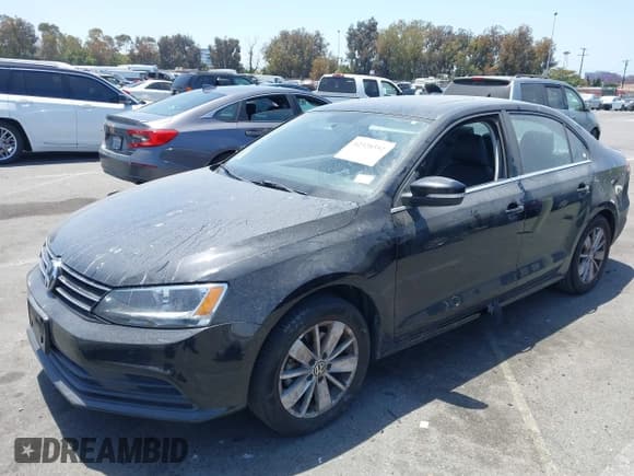 ✅ 2015 Volkswagen Jetta SE • VIN: 3VWD07AJ1FM284890 • Лот: 42328592. Опубликован ранее на IAAI с пробегом 92 880 миль. Бесплатный доступ к архиву аукционных продаж из США и подробный отчёт об истории автомобиля на DreamBid. Изображение 2.