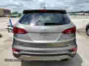 2017 Hyundai Santa Fe 2.0T z VIN 5XYZUDLA9HG437458, wystawiony jako Copart lot #57751415 z przebiegiem 117 469 mil mil oraz Szkoda całkowita • Salvage title. Historia ofert i sprzedaży dostępna na DreamBid. Obrazek 6.
