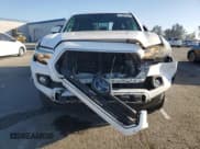 ✅ 2018 Toyota Tacoma SR5 • VIN: 5TFAZ5CN6JX067676 • Лот: 91860595. Опубликован ранее на Copart с пробегом 103 415 миль. Бесплатный доступ к архиву аукционных продаж из США и подробный отчёт об истории автомобиля на DreamBid. Изображение 5.