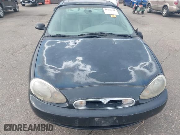 ✅ 1997 Mercury Sable GS • VIN: 1MELM50U5VA656308 • Lot: 41882560. Wystawiony na IAAI z przebiegiem 91 017 mil. Bezpłatny archiwum sprzedaży aukcyjnych z USA i szczegółowy raport historii pojazdu na DreamBid. Zdjęcie 6.