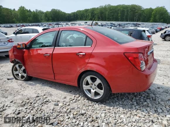 2012 Chevrolet Sonic LTZ с VIN 1G1JE5SH3C4140930, выставлен на аукционе Copart как лот 59429075 с пробегом 101 740 миль миль и Чистый • Clean title. История ставок и продаж доступна на DreamBid. Изображение 2.