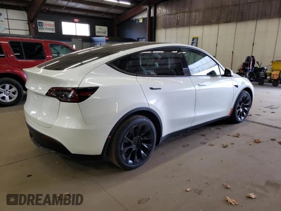 ✅ 2024 Tesla Model Y Long Range • VIN: 7SAYGAEE4RF121950 • Лот: 87409655. Опубликован ранее на Copart с пробегом 23 700 миль. Бесплатный доступ к архиву аукционных продаж из США и подробный отчёт об истории автомобиля на DreamBid. Изображение 3.