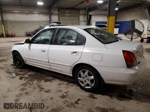 2003 Hyundai Elantra GLS z VIN KMHDN45D23U489919, wystawiony jako Copart lot #83390934 z przebiegiem Nie podano mil oraz Szkoda całkowita • Salvage title. Historia ofert i sprzedaży dostępna na DreamBid. Obrazek 2.