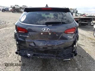✅ 2017 Hyundai Santa Fe 2.4L • VIN: 5XYZUDLB6HG418228 • Лот: 46595523. Опубликован ранее на Copart с пробегом 71 880 миль. Бесплатный доступ к архиву аукционных продаж из США и подробный отчёт об истории автомобиля на DreamBid. Изображение 6.