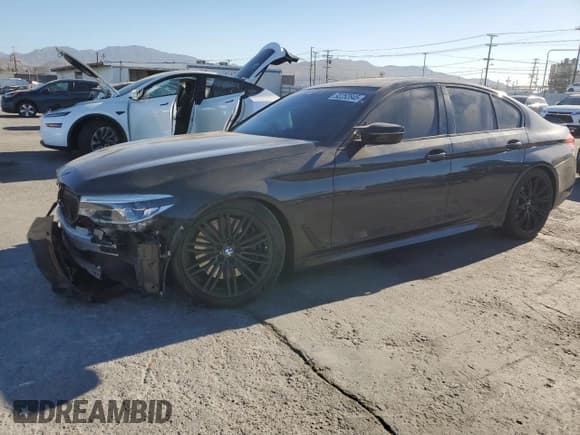 ✅ 2020 BMW 5 Series M550i xDrive • VIN: WBAJS7C03LBN96777 • Lot: 92252845. Wystawiony na Copart z przebiegiem 69 597 mil. Bezpłatny archiwum sprzedaży aukcyjnych z USA i szczegółowy raport historii pojazdu na DreamBid. Zdjęcie 1.