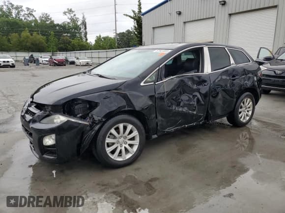 ✅ 2012 Mazda CX-7 i Touring • VIN: JM3ER2C5XC0412422 • Lot: 57941855. Wystawiony na Copart z przebiegiem 199 108 mil. Bezpłatny archiwum sprzedaży aukcyjnych z USA i szczegółowy raport historii pojazdu na DreamBid. Zdjęcie 1.