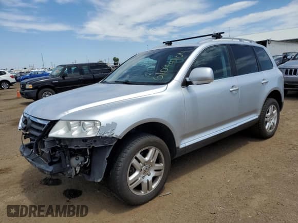 ✅ 2007 Volkswagen Touareg • VIN: WVGZB77L37D023734 • Lot: 61074104. Listed on Copart with 121,784 mi. Free auction sales archive from the USA and detailed vehicle history report at DreamBid. Image 1.