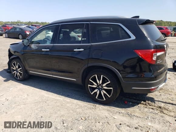 ✅ 2020 Honda Pilot Touring 7-Passenger • VIN: 5FNYF5H65LB009516 • Lot: 81001735. Listed on Copart with 66,757 mi. Free auction sales archive from the USA and detailed vehicle history report at DreamBid. Image 2.