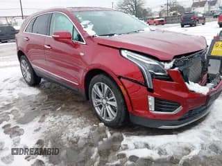 ✅ 2023 Cadillac XT5 AWD Premium Luxury • VIN: 1GYKNDRS6PZ111495 • Lot: 41185409. Listed on IAAI with 15,555 mi. Free auction sales archive from the USA and detailed vehicle history report at DreamBid. Image 1.
