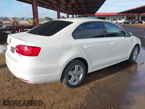 ✅ 2012 Volkswagen Jetta TDI • VIN: 3VWLL7AJ0CM368715 • Lot: 43764557. Listed on IAAI with 124,361 mi. Free auction sales archive from the USA and detailed vehicle history report at DreamBid. Image 4.