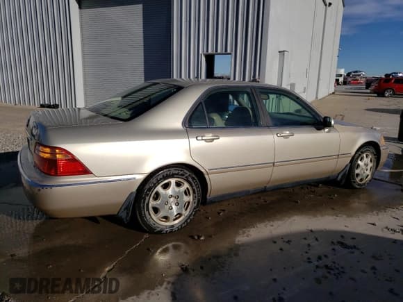✅ 2000 Acura RL • VIN: JH4KA9656YC014653 • Лот: 79079074. Опубликован ранее на Copart с пробегом 174 392 миль. Бесплатный доступ к архиву аукционных продаж из США и подробный отчёт об истории автомобиля на DreamBid. Изображение 3.