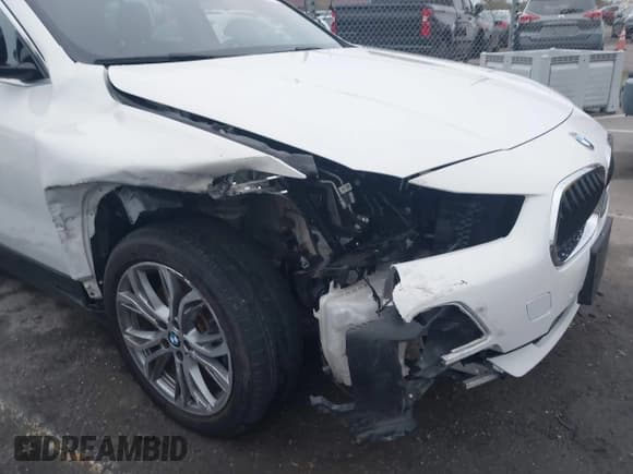 ✅ 2022 BMW X2 sDrive28i • VIN: WBXYH9C0XN5U31955 • Lot: 43793790. Listed on IAAI with 86,977 mi. Free auction sales archive from the USA and detailed vehicle history report at DreamBid. Image 6.